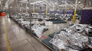 As reported by NPR: Detainees sleep and watch television in a holding cell where hundreds of mostly Central American immigrant children are being processed at a U.S. Customs facility in Nogales, Texas. 