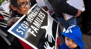 As reported in Politico on 8/7/15: US citizens Esmeralda Tepetate, 10, with her brother Sebastian, 2, whose parents are originally from Mexico, holds a sign that says "stop separating families" during a rally for comprehensive immigration reform, Friday, Nov. 7, 2014,  outside of the White House in Washington. After the midterm elections immigration groups are pushing for executive action. (AP Photo/Jacquelyn Martin)