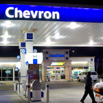 Gasoline pumps situated at a Chevron station in Milpitas, Calif., in February. A federal judge ruled that a record $9.5 billion environmental-damage award against Chevron was tainted. ASSOCIATED PRESS