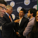 Washington state Attorney General Bob Ferguson, left, speaks with Graciela Nuñez, a DACA recipient, at a Seattle news conference called to announce Washington’s participation in a lawsuit against the Trump... (Alan Berner/The Seattle Times) 